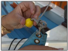 Photo 17, Fixing a rope stopper to a sail